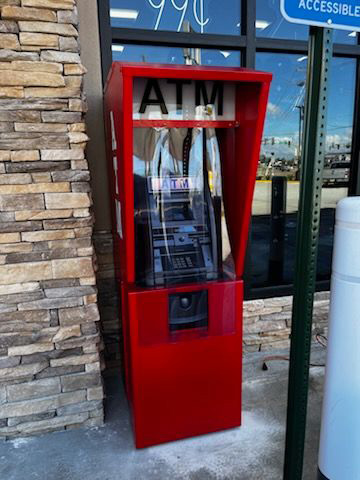 Freestanding ATM installed outside a retail storefront