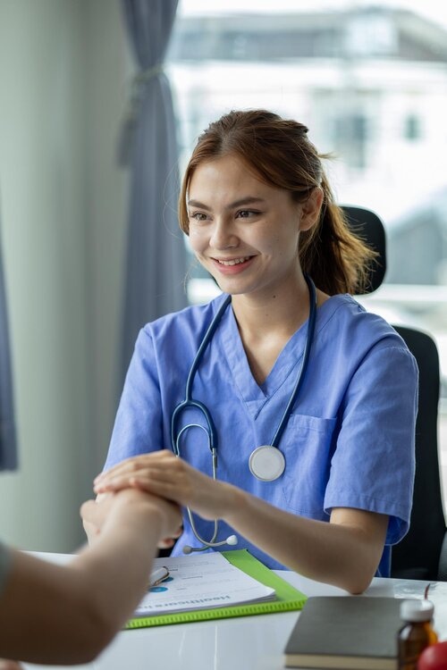 Doctor consulting with a patient in a medical office